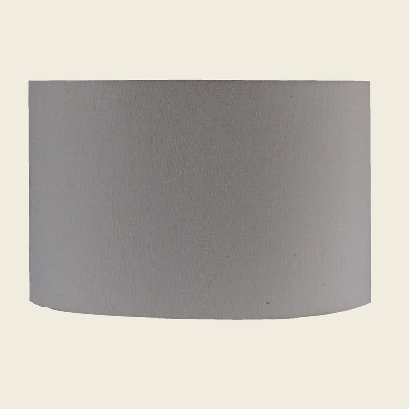 Drum shape lamp shade in light pink color.