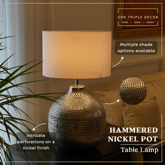 Image showing a handmade metal table lamp with perforated holes as design.