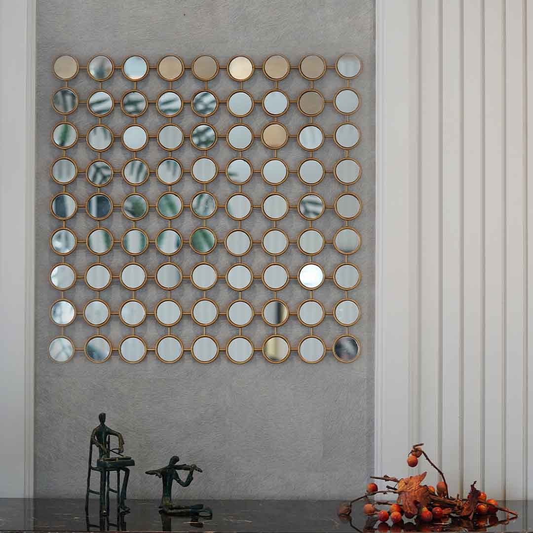 Front view of a modern metallic wall art made of 81 small mirrors.