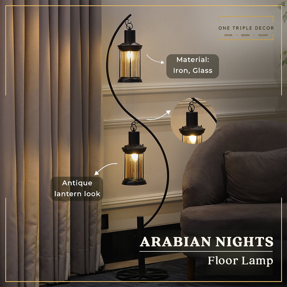 A metallic floor lamp with 2 hanging lanterns in a living room with product features highlighted on the image.