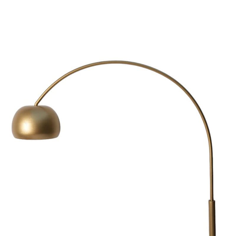 A plain background, close-up image of the top section image of an arched tall metallic floor lamp with a marble base.