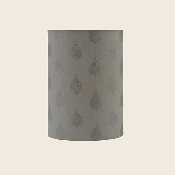 Cylinder shape lamp shade in white color.