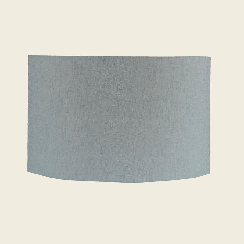 Drum shape lamp shade in light green color.