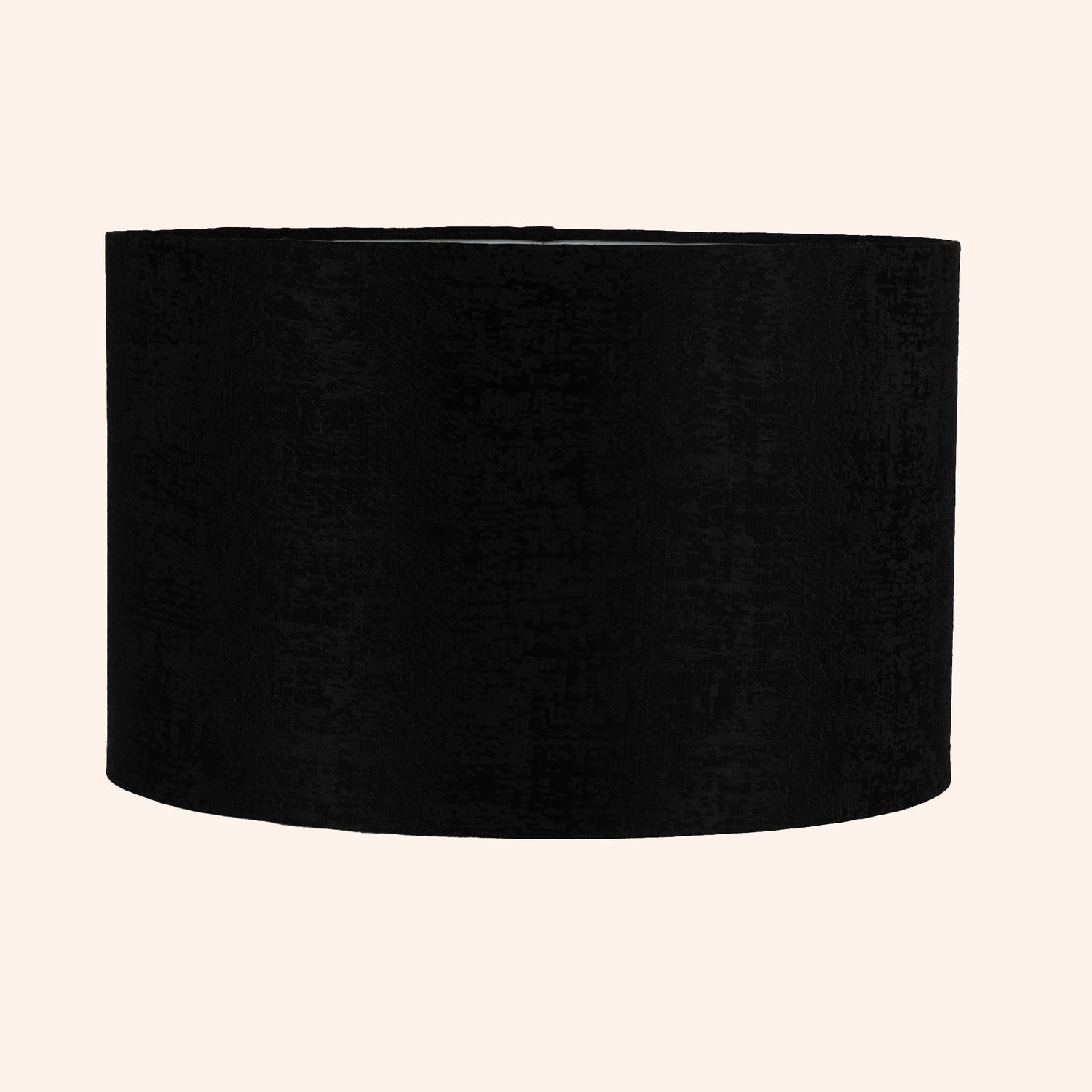 Drum shape lamp shade in black color.