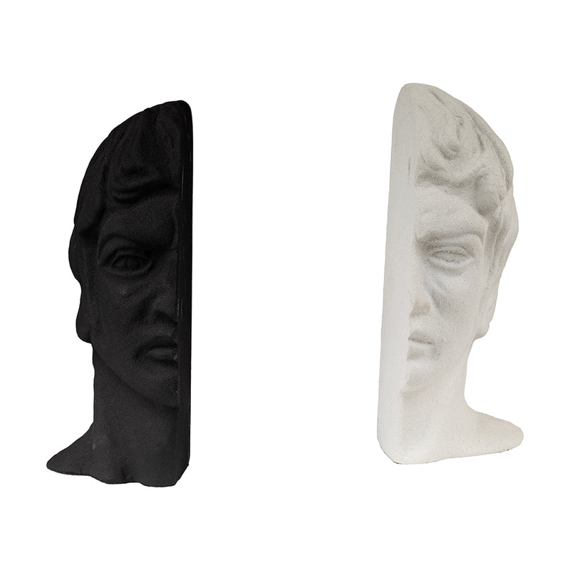 2 parts of a bookends set with a man's face split in half, black and white color in a plain background.