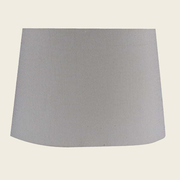 Tapered drum shape lamp shade in light pink color.