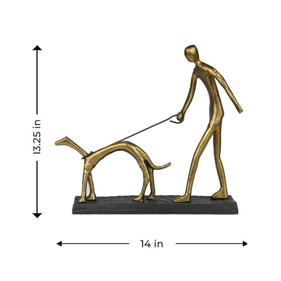 Table top metal sculpture of a man walking a dog, with dimensions.