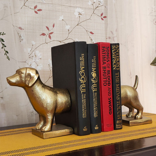 Bookend in design of a dog split in two parts with 4 books in between, side angle.