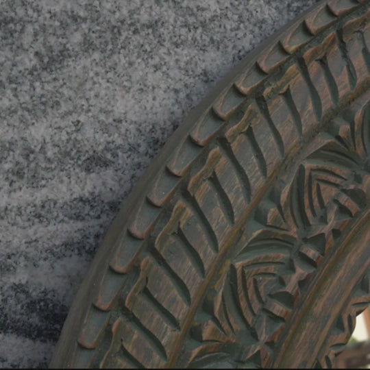 Zoomed in video of traditional hand carving work on mango wood