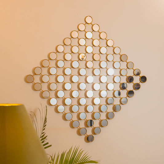 A sparkling wall art made of 81 round pieces of mirrors, placed on a wall in a living  room.